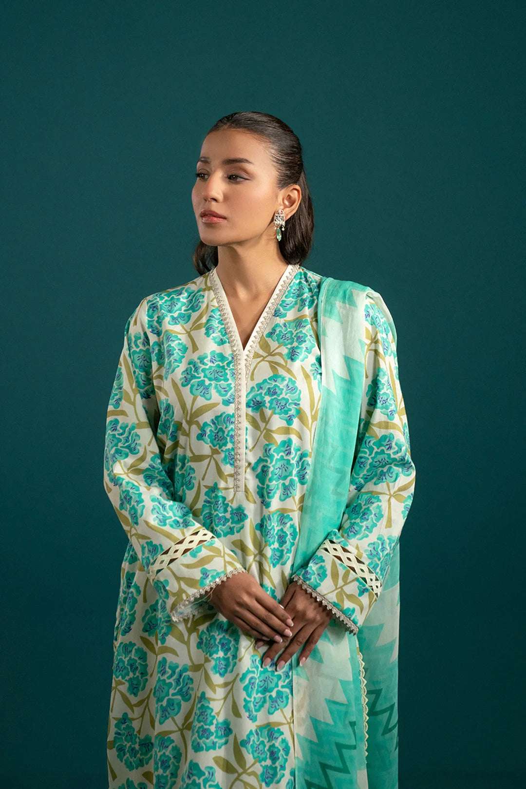 Lawn suit design with dupatta – a contemporary take on traditional fashion, featuring an intricate floral print with a contrast geometric patterned dupatta.