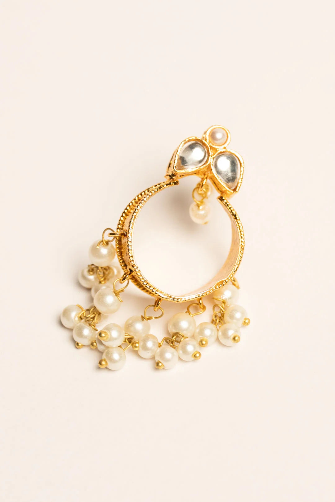  Lightweight gold Kundan hoop earrings beige background product photography Pakistani jewellery