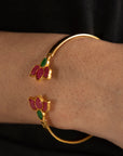 Lotus motif kundan bangle bracelet on wrist, festive jewelry for weddings and mehndi