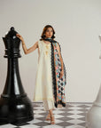 Soft tonal self embroidery texture on ivory premium lawn shirt with ruffle neckline detail from Beyond East