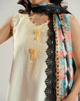 Rear drape of bold printed dupatta over ivory self embroidered lawn dress showing fabric movement and fall