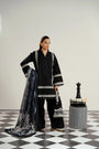 Beyond East designer black lawn kameez with luxurious white threadwork and bold printed silk dupatta 