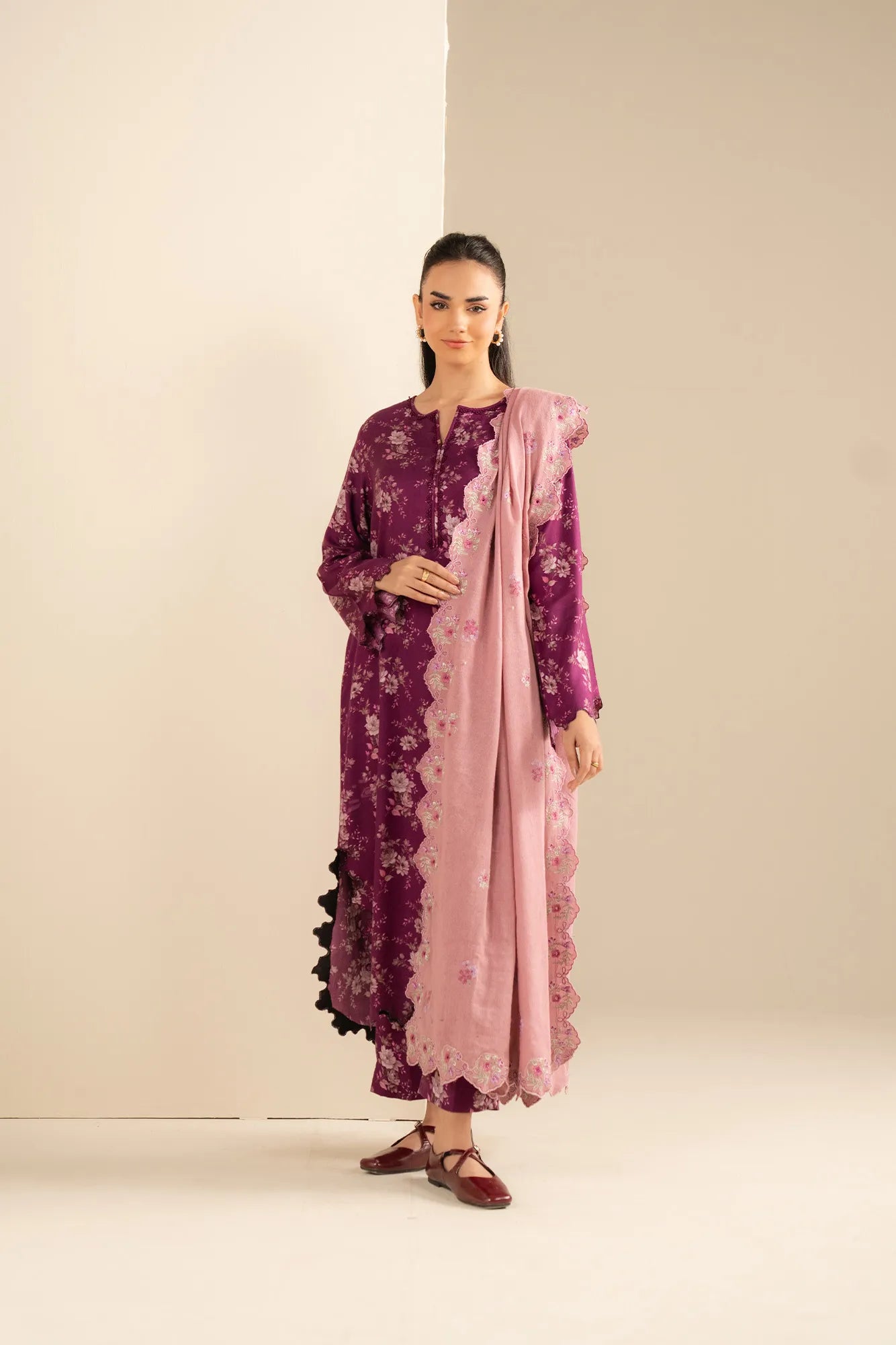 Marina fabric traditional outfit featuring magenta-purple printed kurta set and blush pink scalloped dupatta drape.