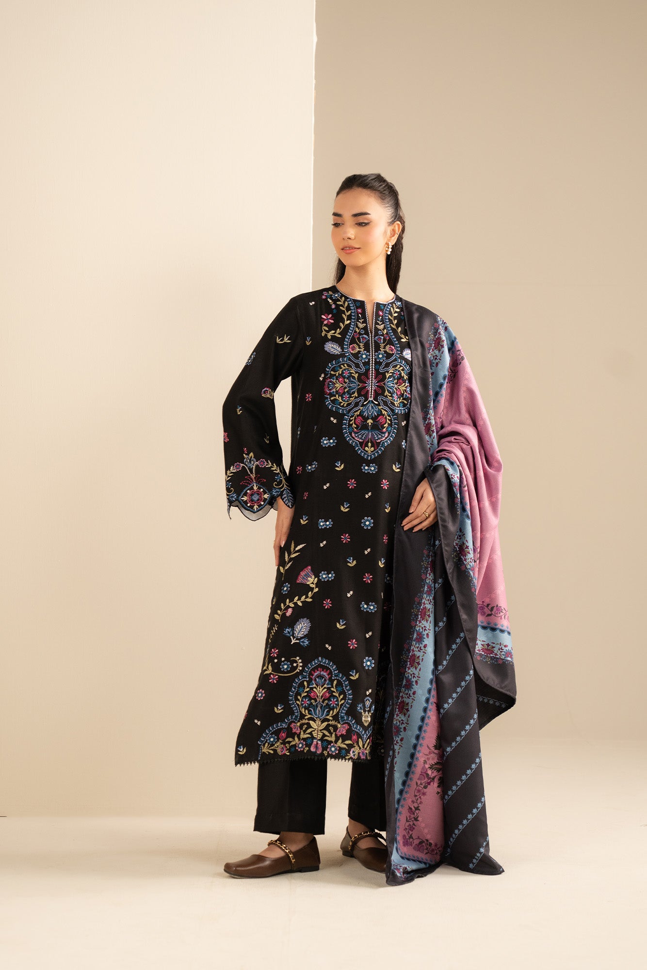 Mid-shot of model with shawl drape highlighting front embroidery placement and neckline finish.