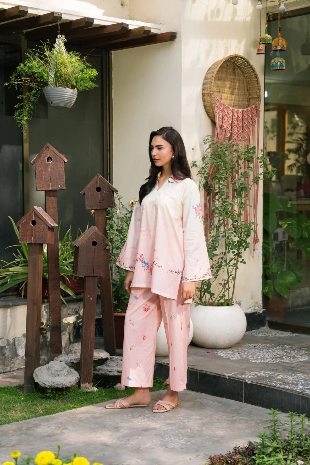 Model wearing pastel pink ready-to-wear silk matching set