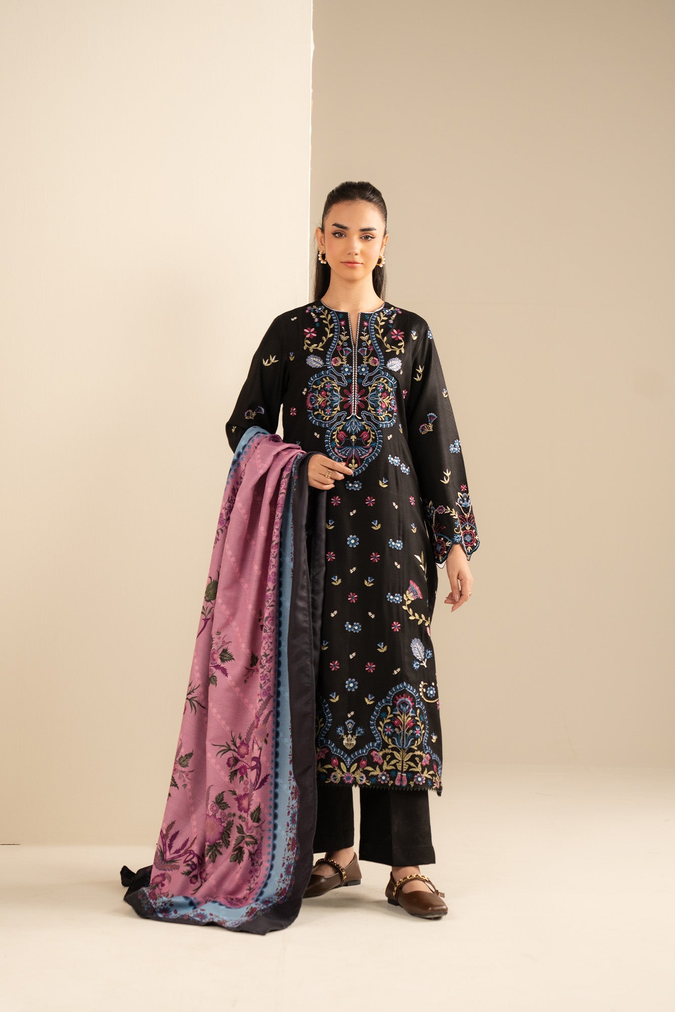 Model wearing unstitched embroidered Marina suit with printed herringbone shawl, full front view in studio.