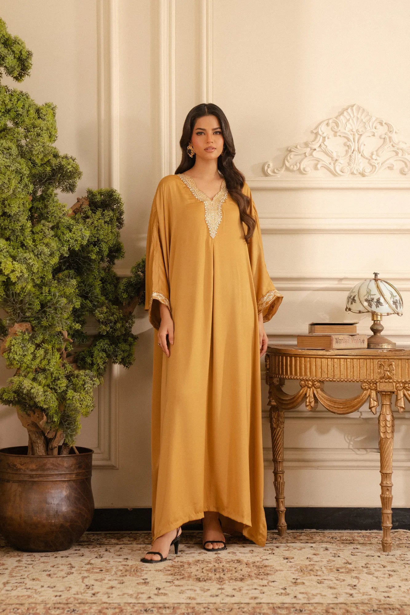 Mustard yellow Pakistani kaftan dress with gold embroidery