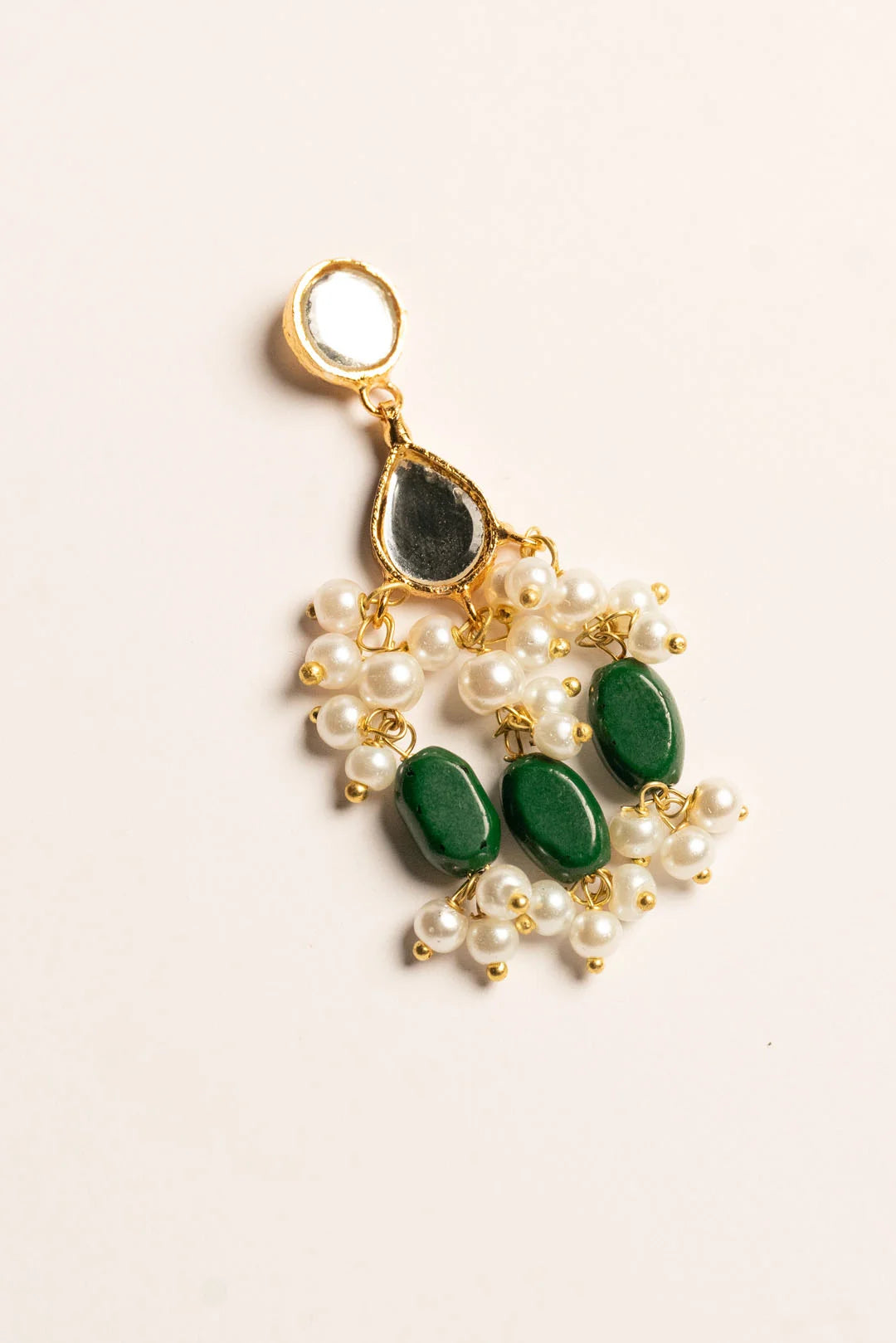 Pakistani bestselling green chandbali earrings flatlay pearl spacer teardrop stone jewellery online