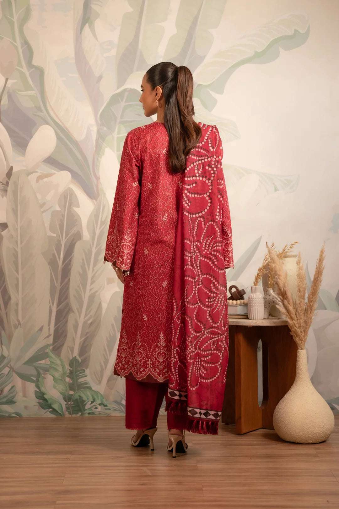 Pakistani summer lawn suit for women, featuring an elegant maroon shirt with a beautifully patterned Monark dupatta for a graceful look.