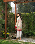 Pakistani women printed cambric midi kameez side pose garden outdoor beyond east 2026