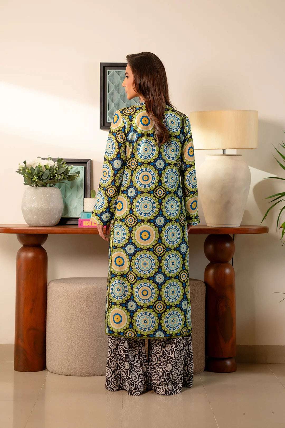 Pakistani women’s stitched dress – bold digital print cambric shirt and matching printed trousers.