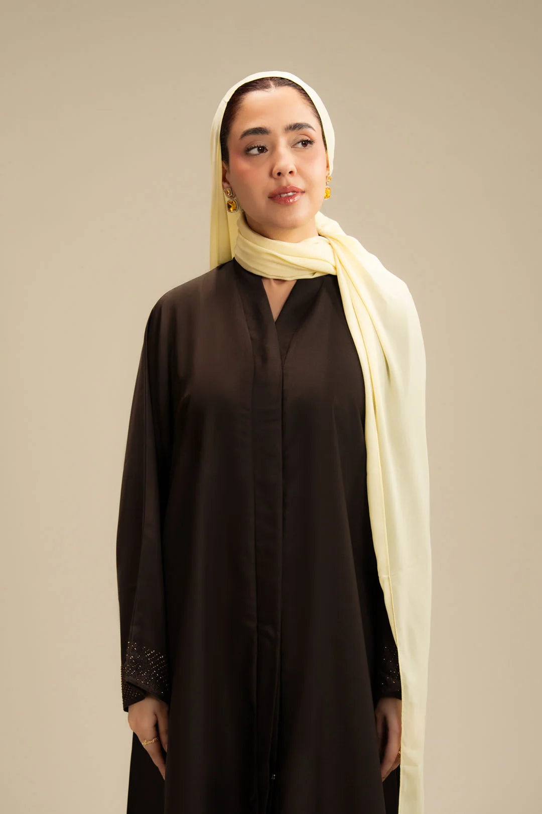 Pastel yellow abaya scarf with black abaya contrast look – buy abaya scarf online Pakistan Beyond East