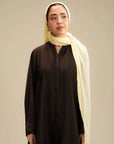 Pastel yellow abaya scarf with black abaya contrast look – buy abaya scarf online Pakistan Beyond East