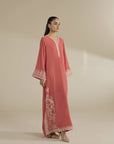 Peach velvet kaftan dress from side angle showing relaxed drape