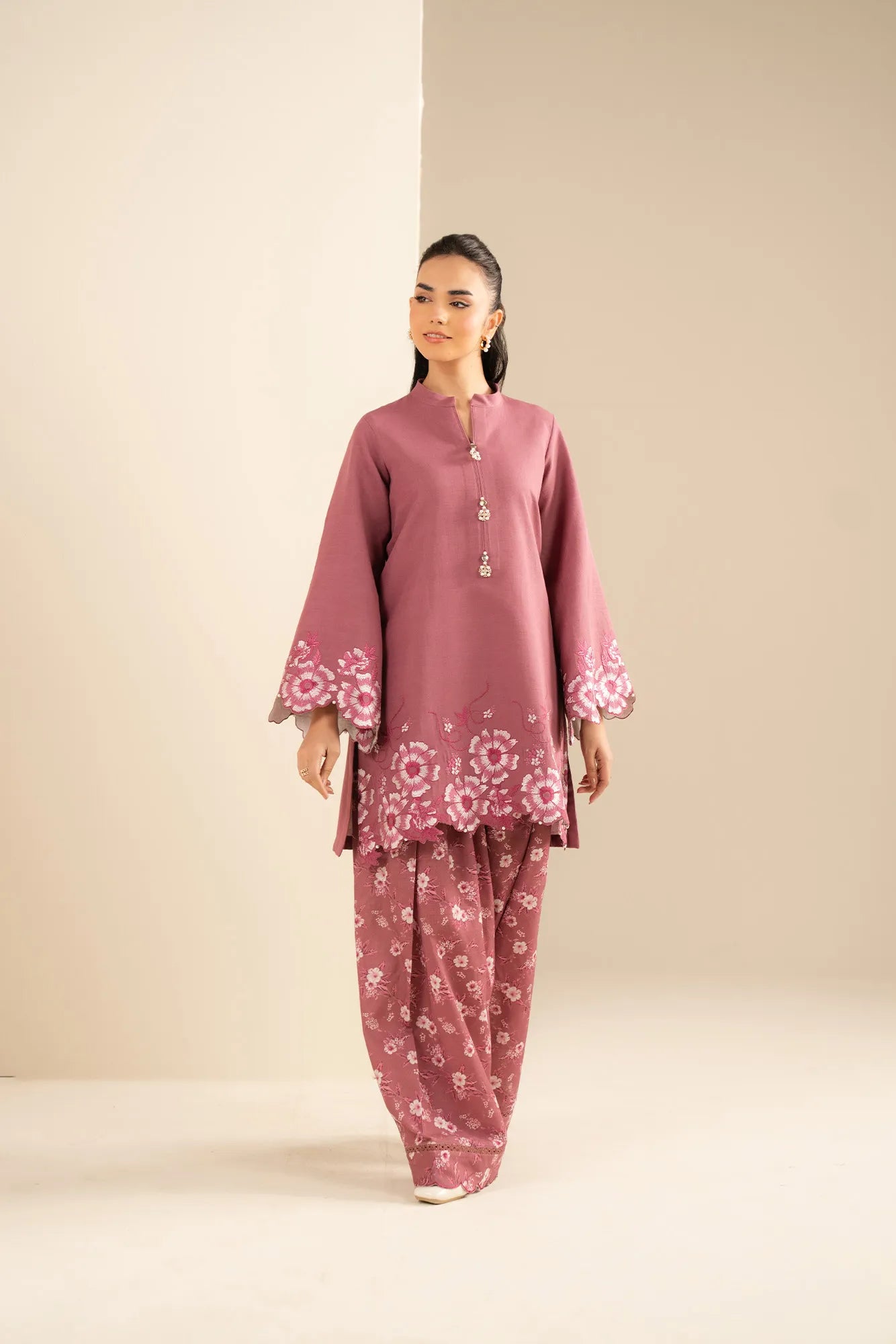 Pink embroidered khaddar unstitched 2 piece suit with printed slub trouser