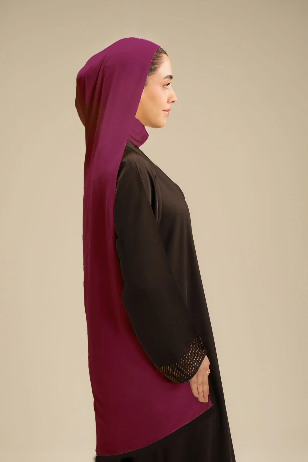 Plum hijab scarf styled with black abaya – best contrast scarf for abaya Pakistan Beyond East