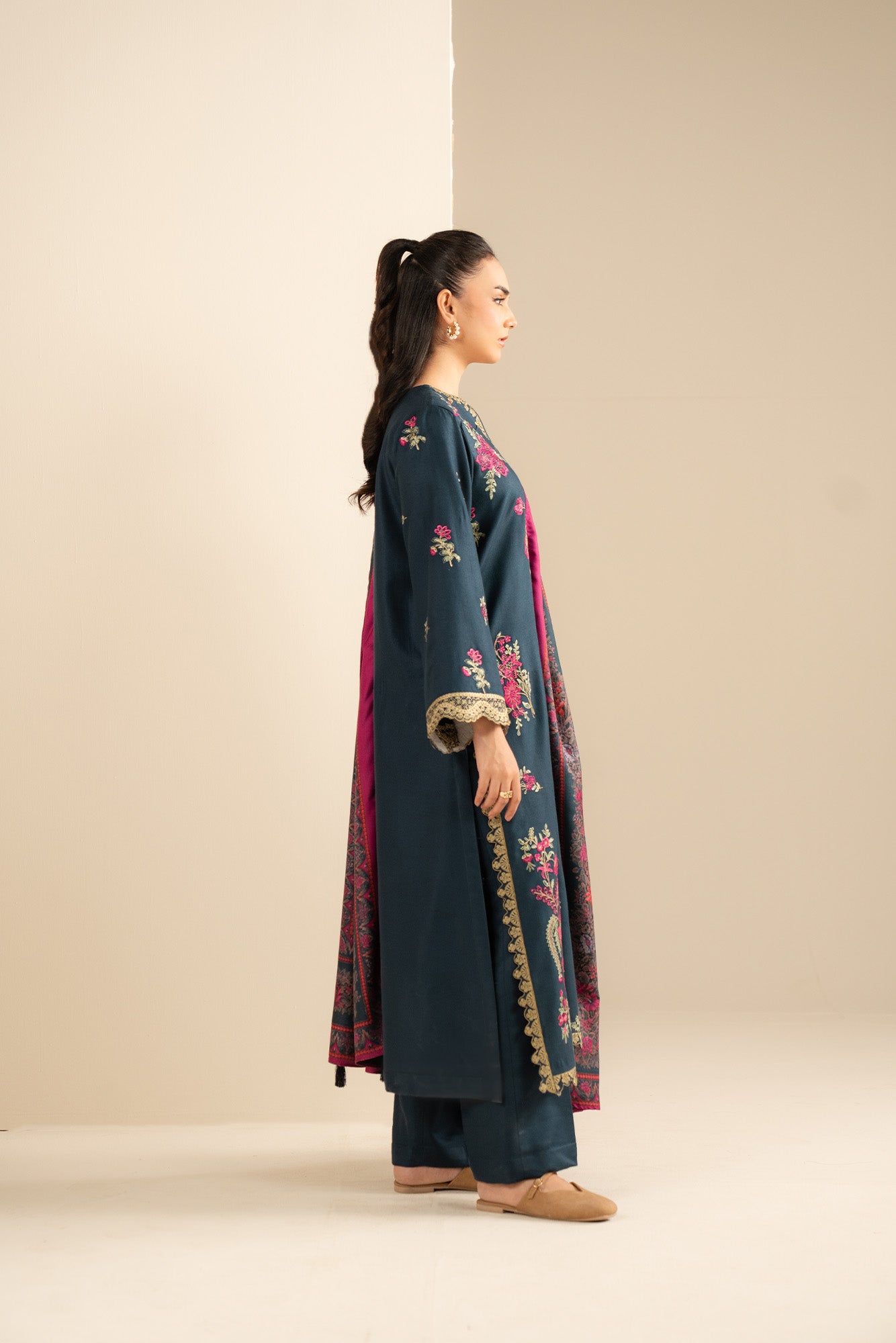 Printed herringbone shawl shown draped, highlighting overall print and border.