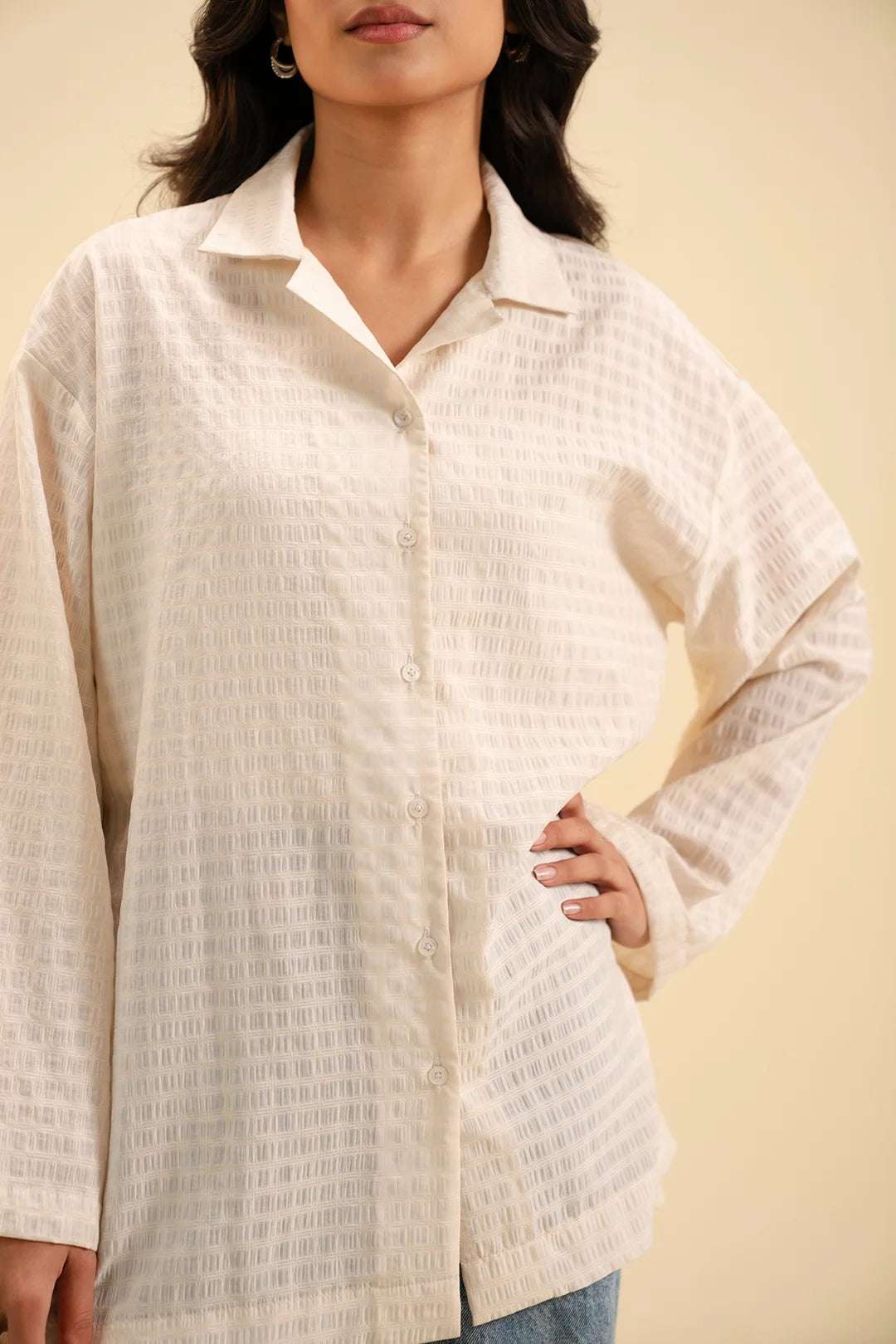 Relaxed-fit button-down shirt for women – perfect for work or weekend looks.