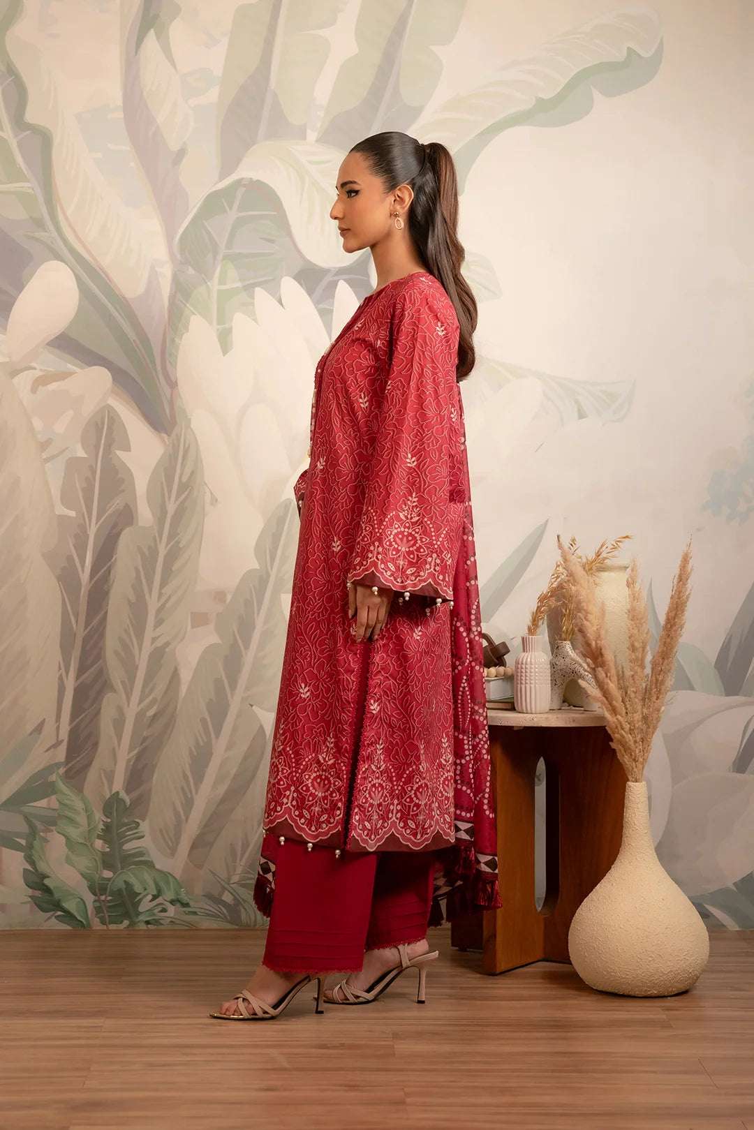 Sale 70% off unstitched printed lawn – a stunning two-piece maroon lawn suit with intricate prints and a timeless chuniri-style dupatta.