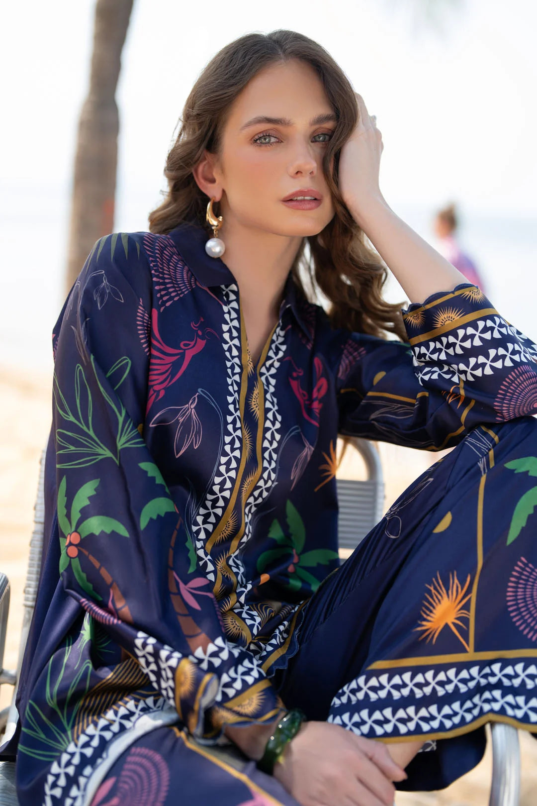 Seated side view of blue printed ready-to-wear co-ord set for women