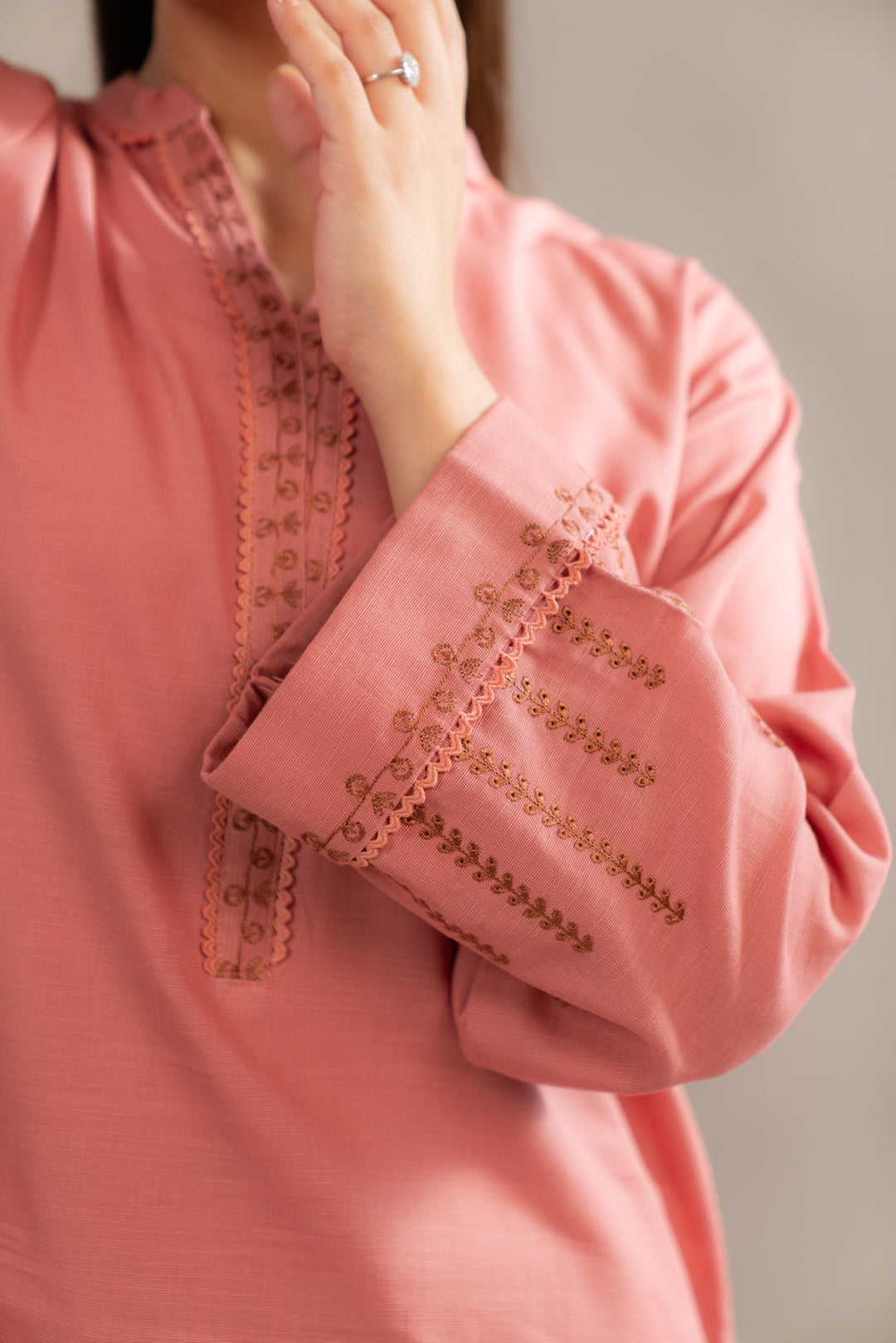 Shop 2-Piece Pink Khaddar Suit with Intricate Embroidery – Ideal for Winter Fashion in Pakistan
