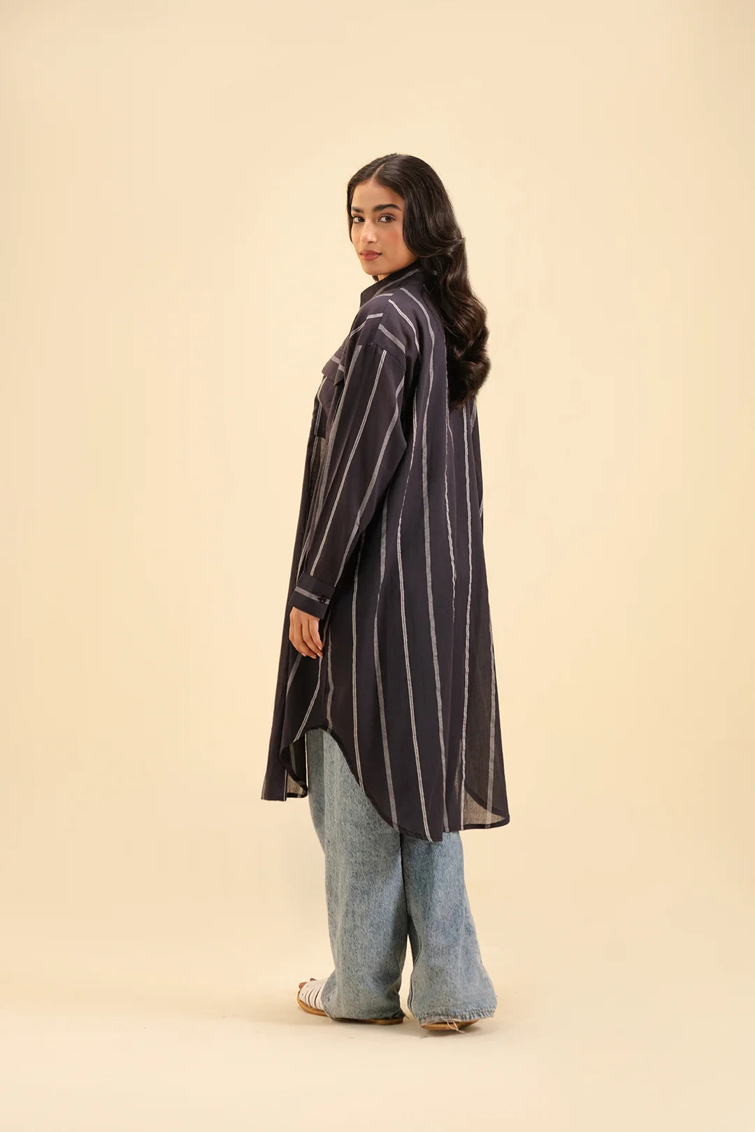 Shop black striped button-down shirt – versatile layering piece for all seasons