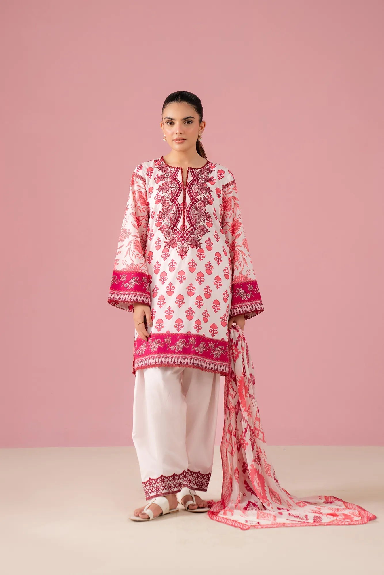 Shop embroidered lawn dress in white and pink with dyed cambric trouser and voile dupatta, designed for ladies in Jhelum's Satellite Town Pakistan