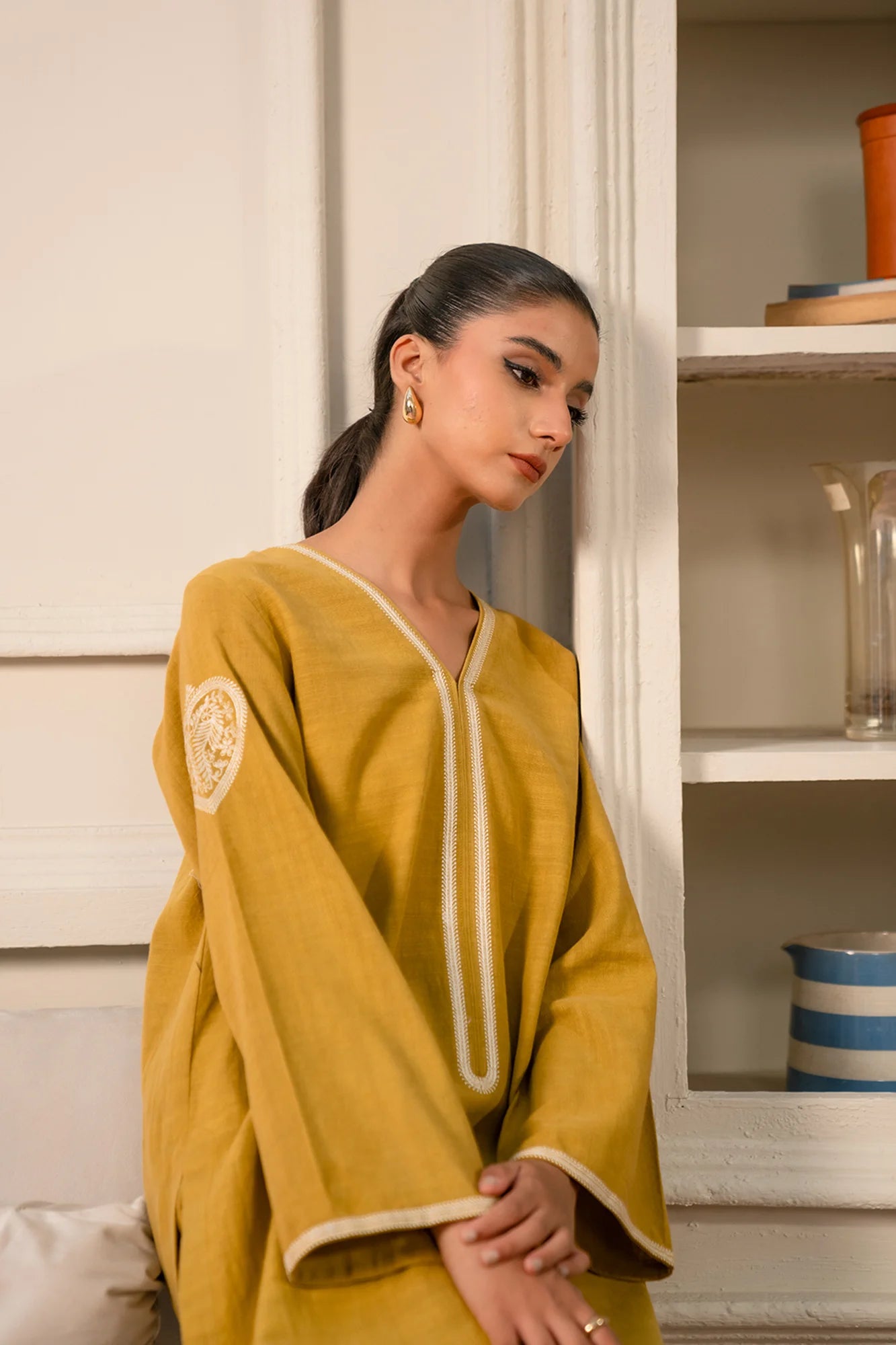 Shop now 2 Piece Embroidered Khaddar design Mustard