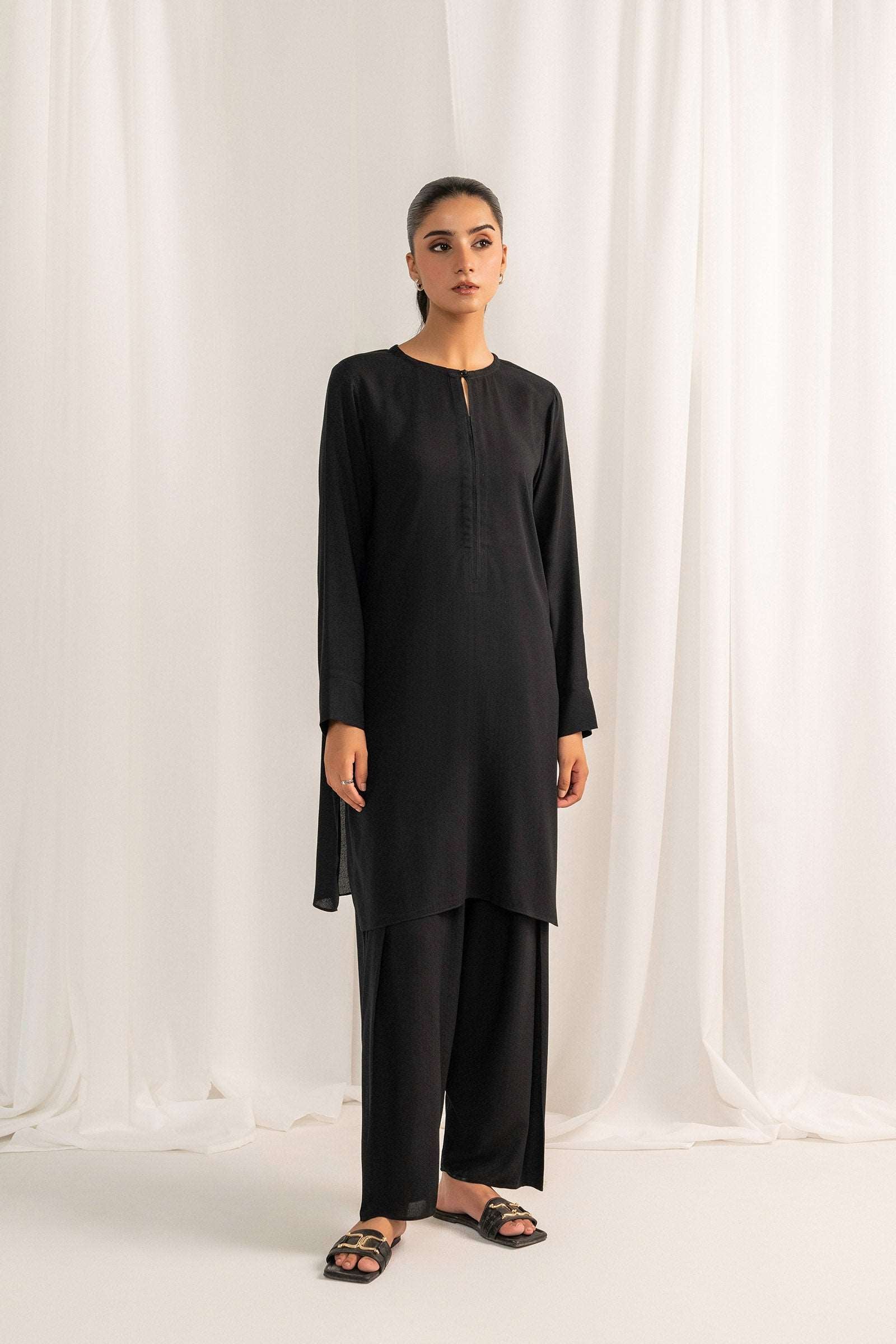 Shop solid charcoal grey 2-piece viscose suit for women, designed for chic and versatile styling