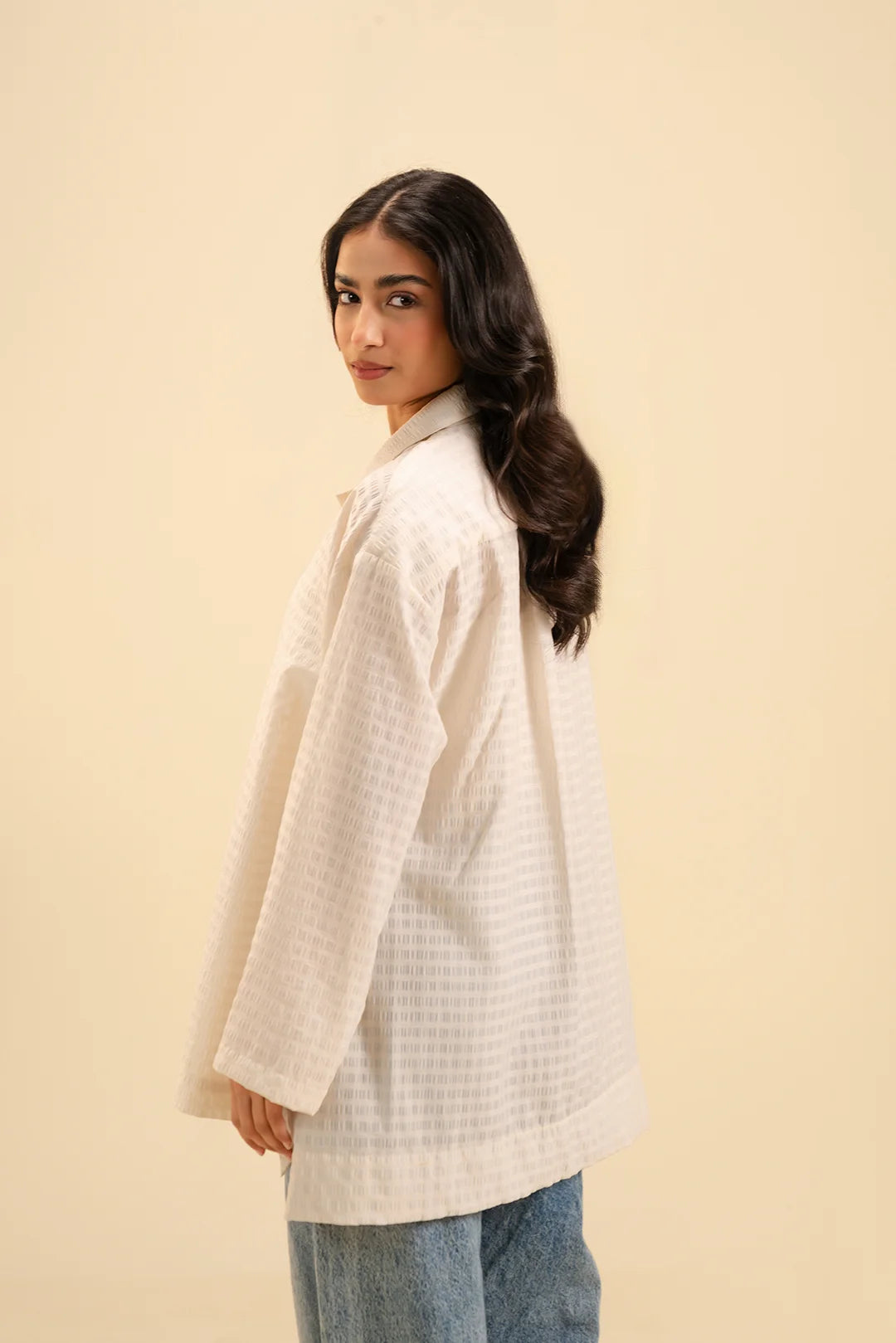 Shop trendy oversized button-up shirt – effortless style in neutral tones.
