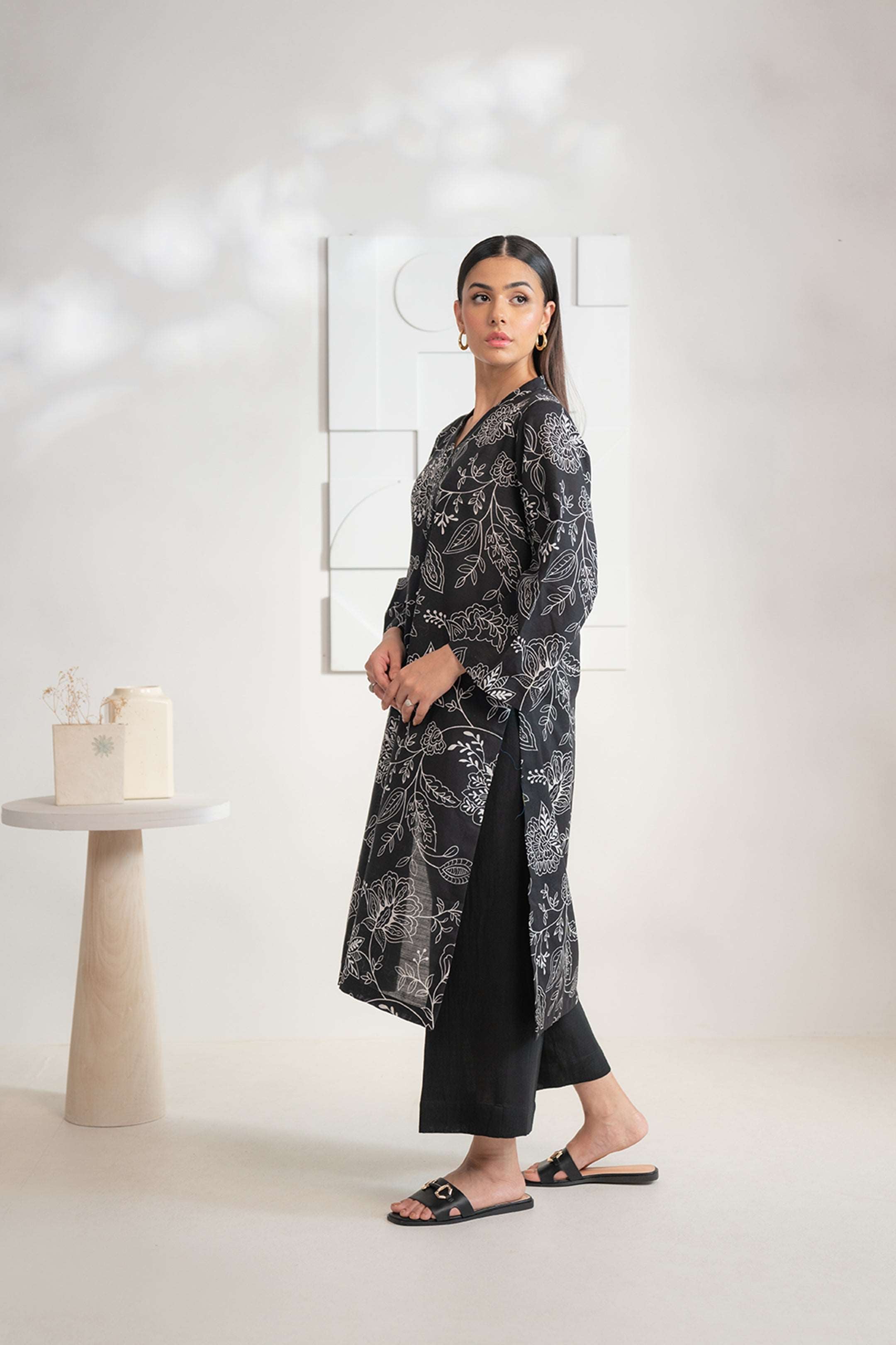 Shop women’s 1-piece printed Karandi shirt in a classic black and white shade online today