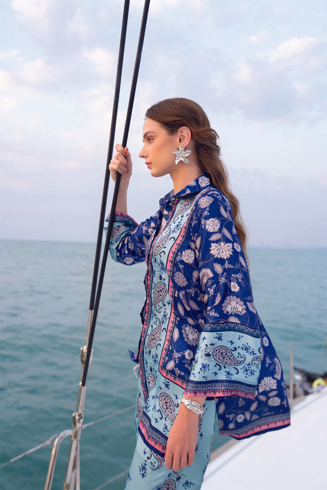 Side angle of blue and sea green printed satin-feel co-ord set