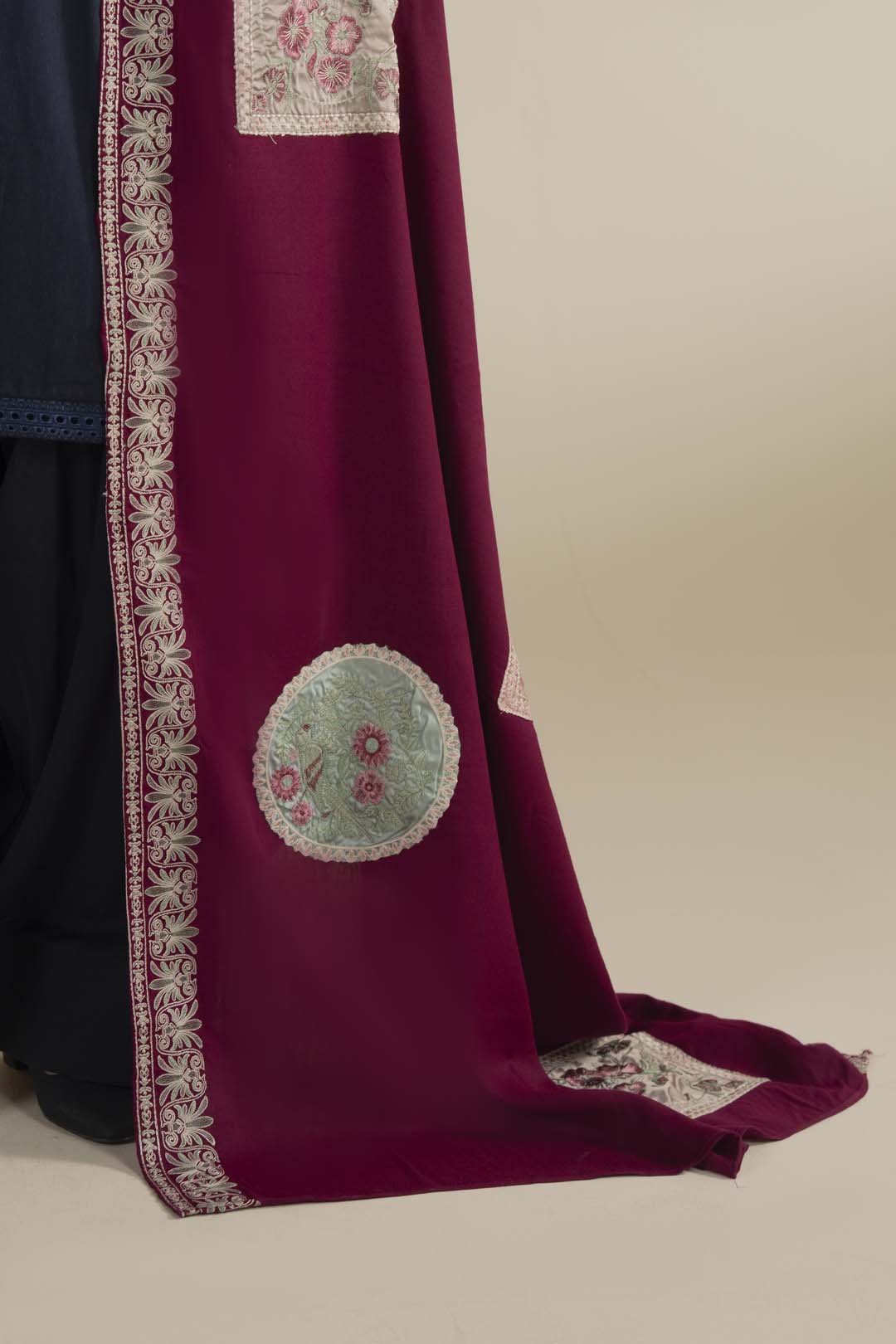 Side angle of the shawl wrap showing coverage, fall, and border alignment along the edge.