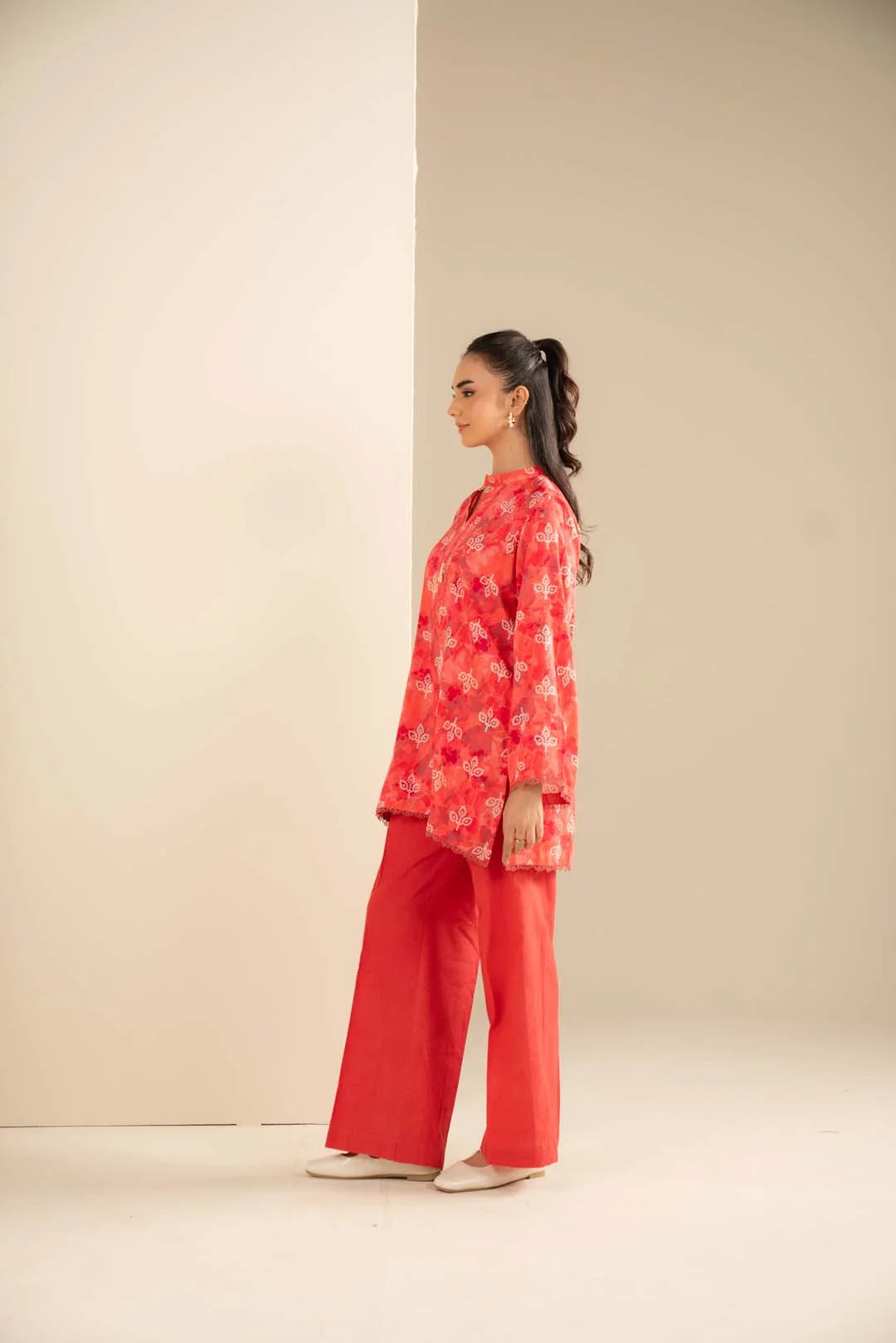 Side profile of the printed 2-piece set showing drape, length, and clean trouser fall.