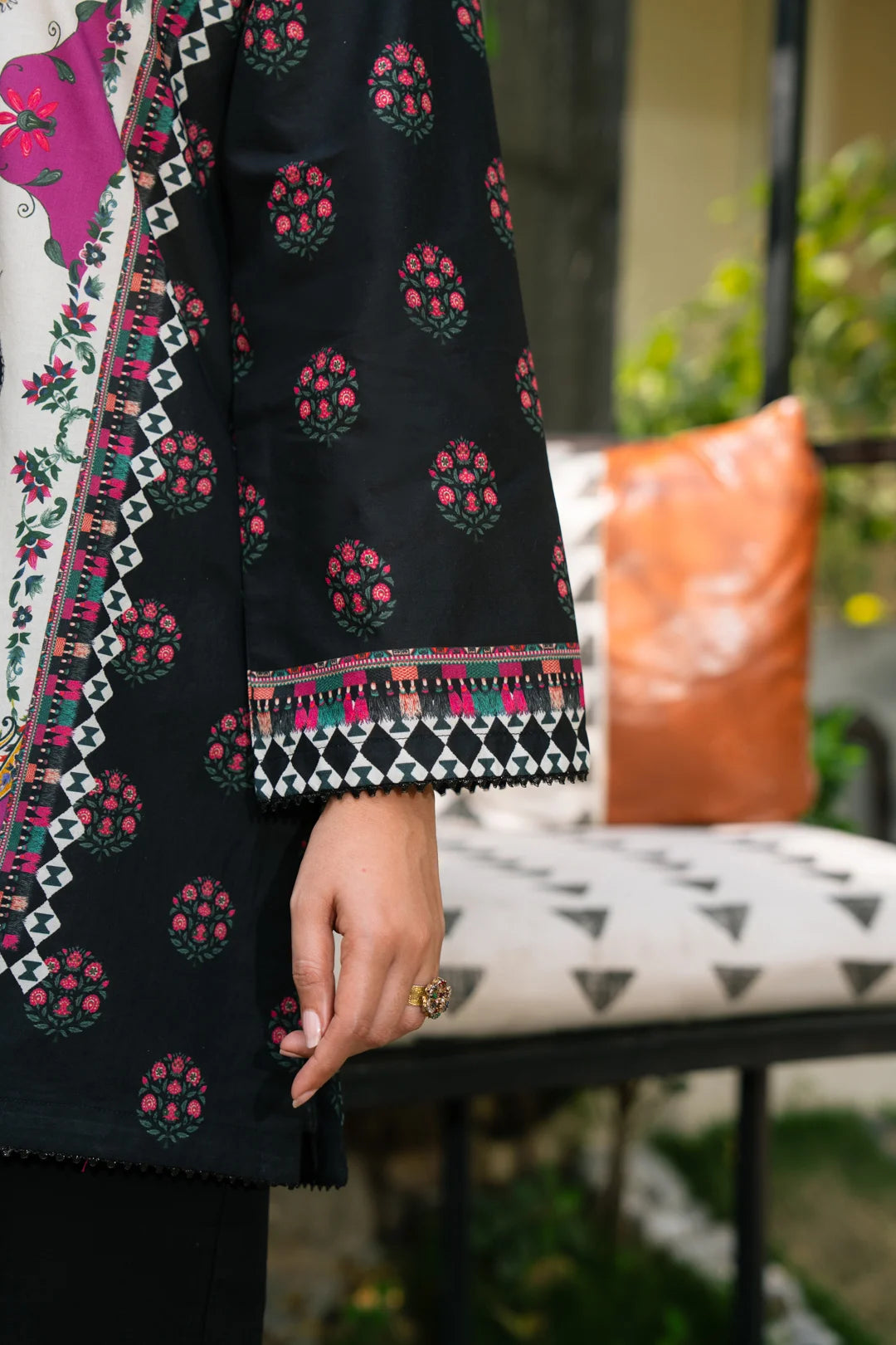 Side view of black ready-to-wear printed kurti top for women