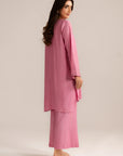 Side view of light pink women’s linen 2 piece suit with matching trousers