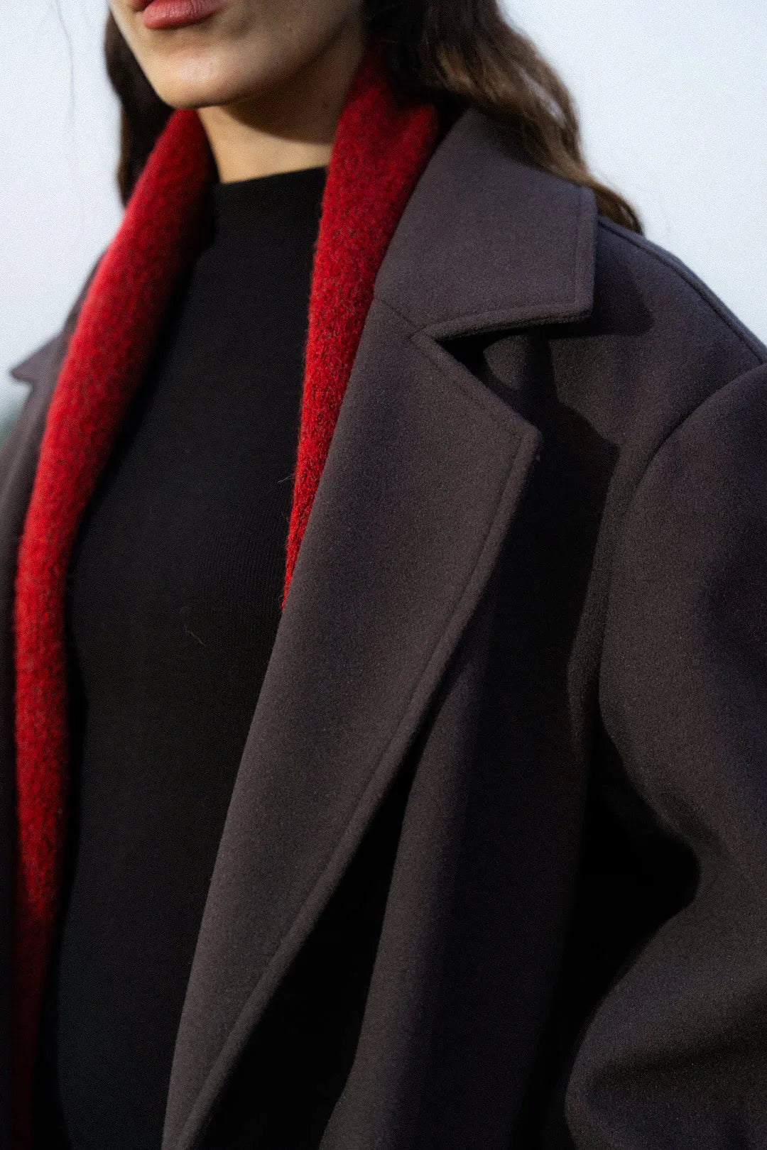 Sleeve and cuff detail of stretch dark grey longline coat