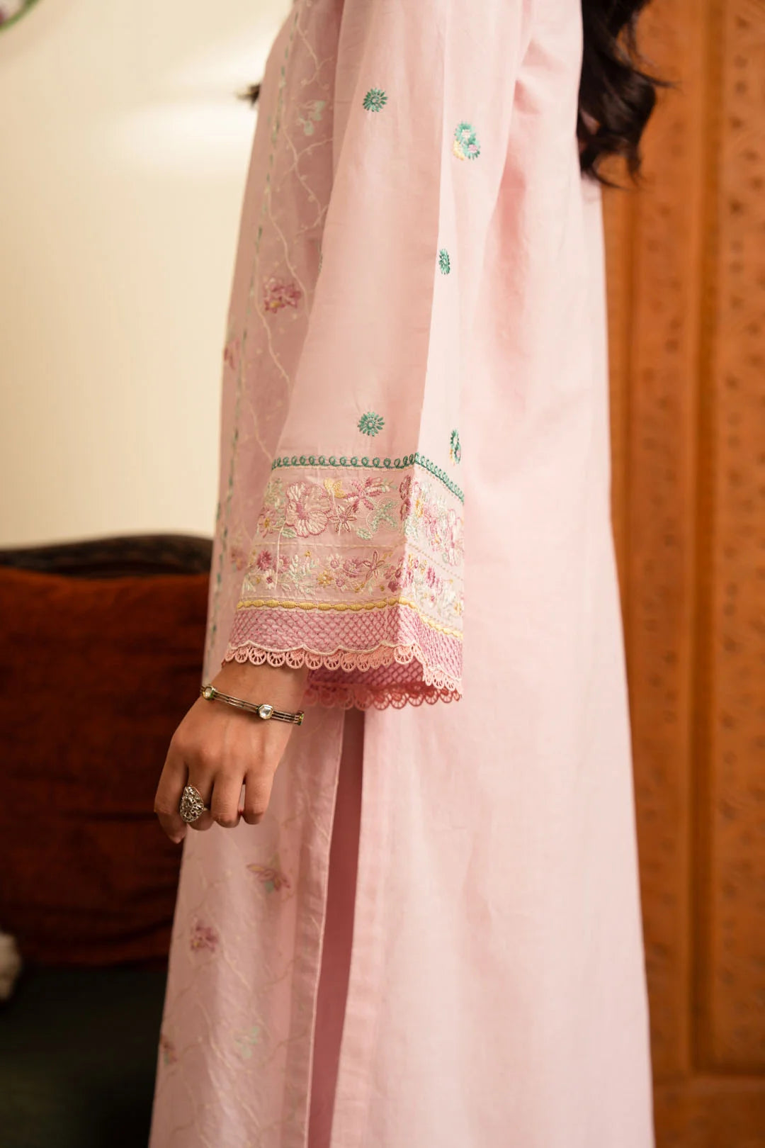 Sleeve detail of pastel pink embroidered lawn shirt