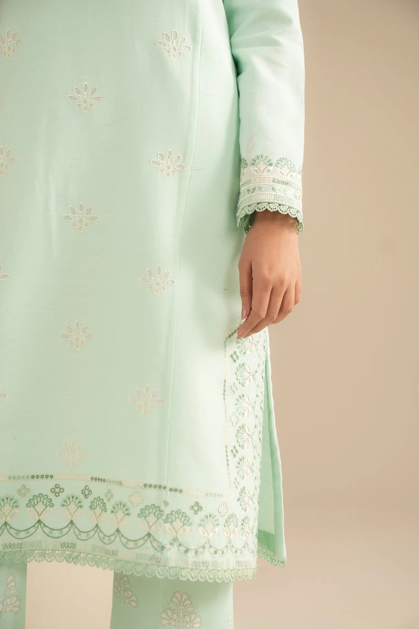 Sleeve embroidery detail on pastel khaddar winter suit unstitched