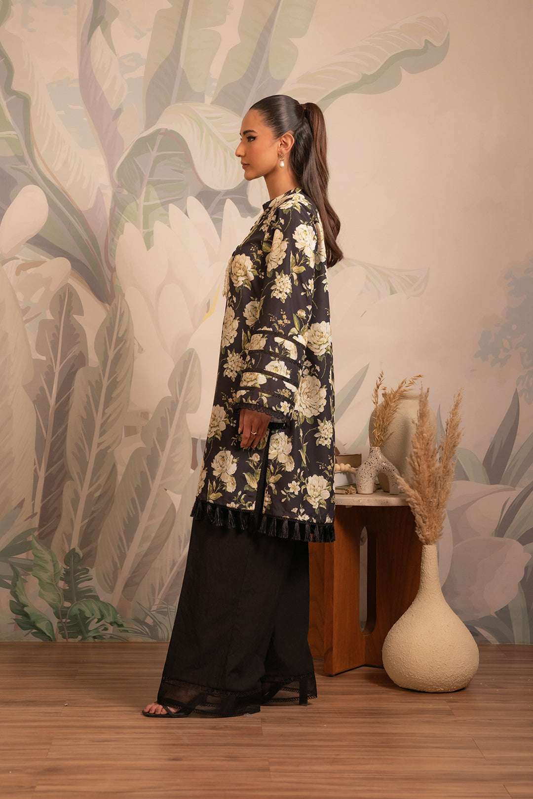 Stylish black cambric kurta for ladies – elegant floral print design for casual and formal wear.