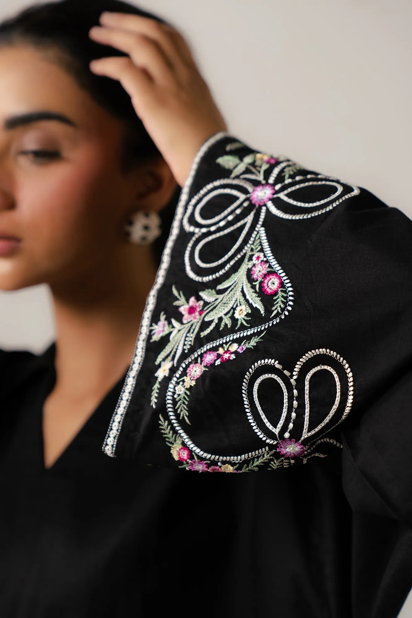 Stylish black cambric shirt with collar and embroidery