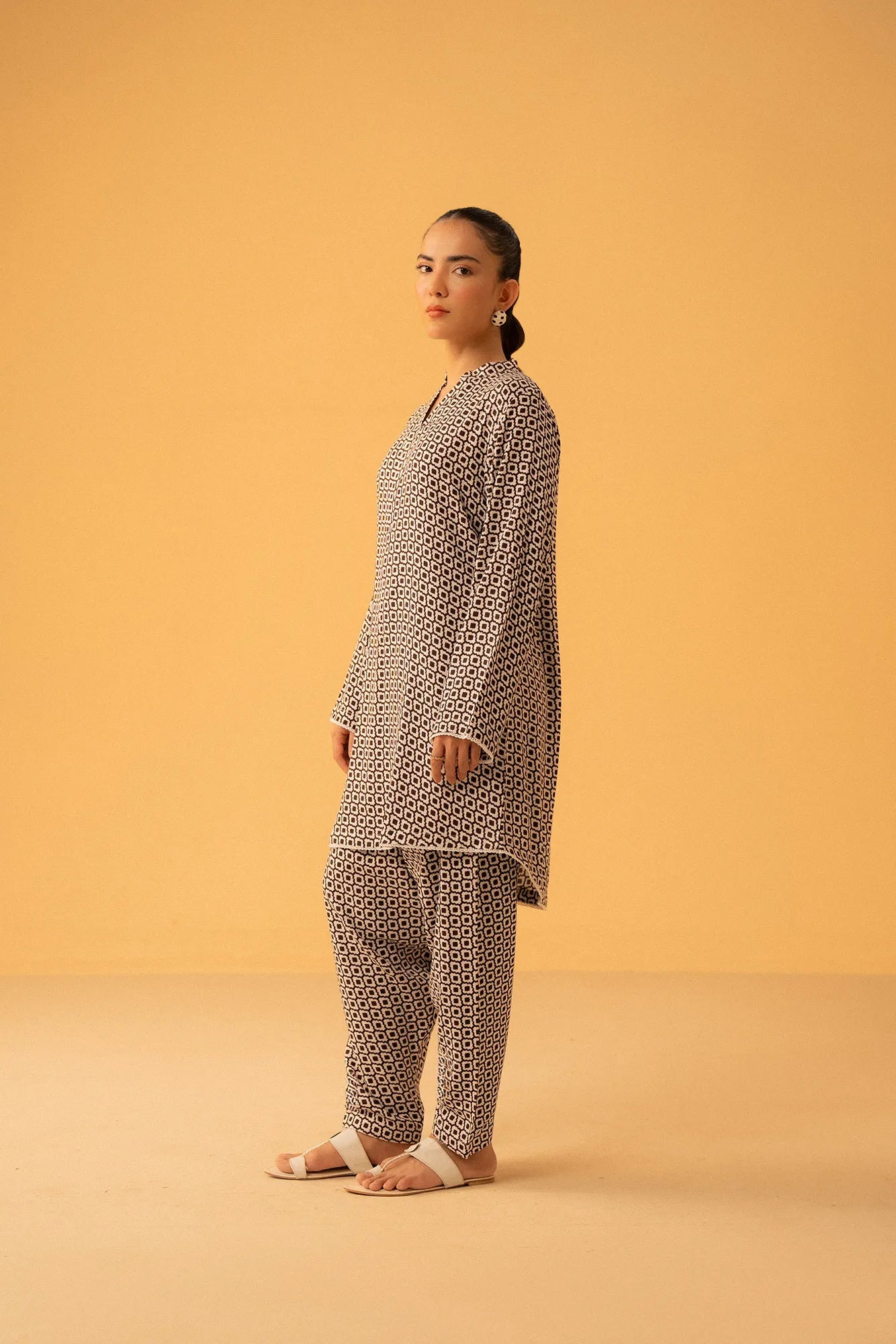 Stylish geometric printed suit design for women – Beyond East collection