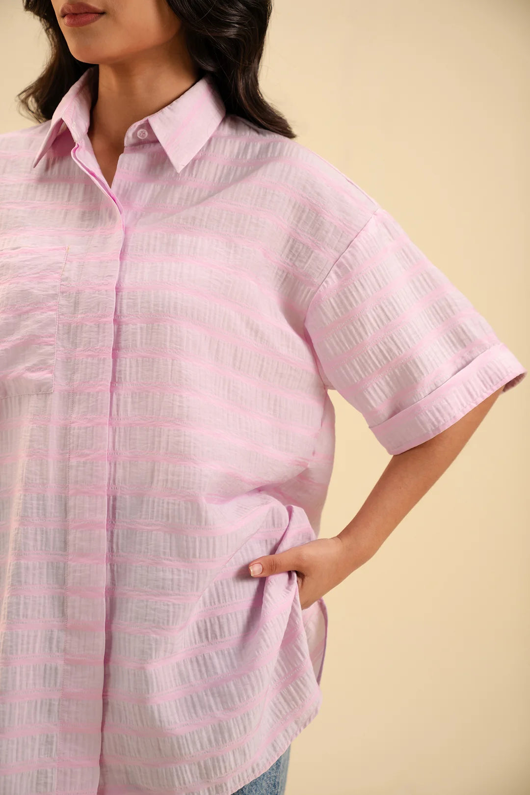 Stylish pink button-down top – perfect for office wear and weekend outings.