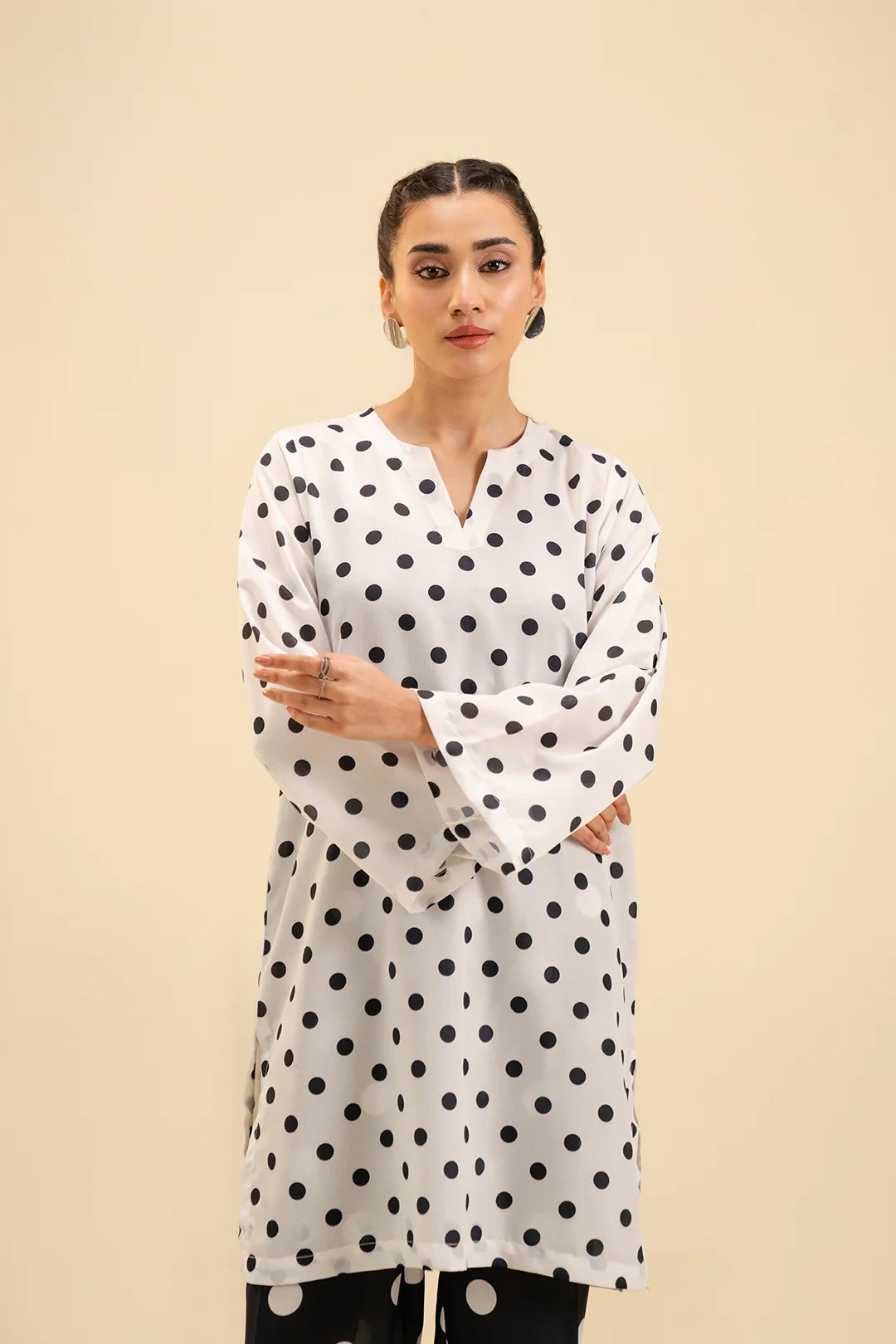 Stylish polka dot print cambric dress – modern fashion for every occasion.