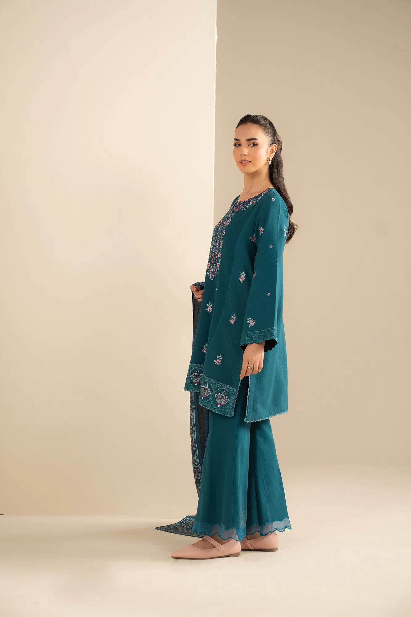 Teal khaddar shirt embroidery detail on front panel