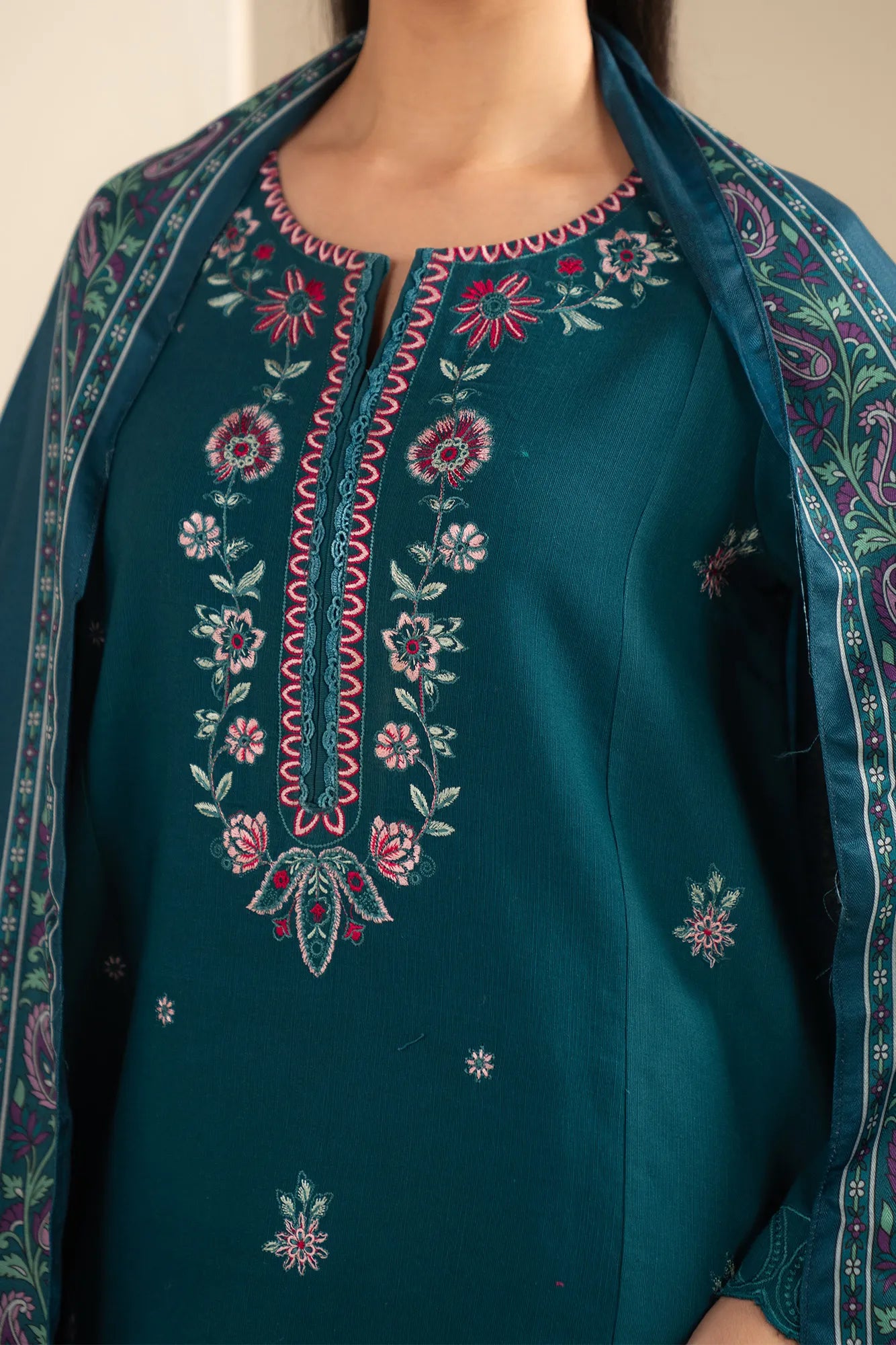 Teal unstitched khaddar suit side view with matching trouser