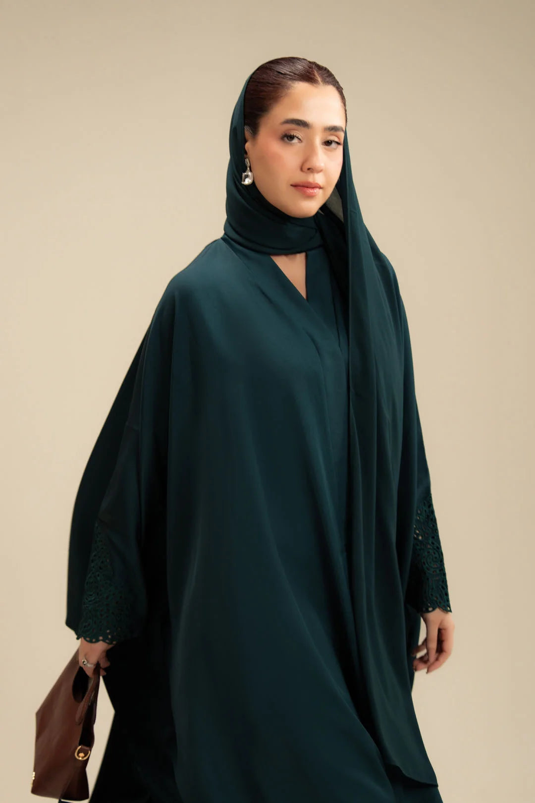 Three quarter view emerald abaya – dark green modest wear abaya Beyond East