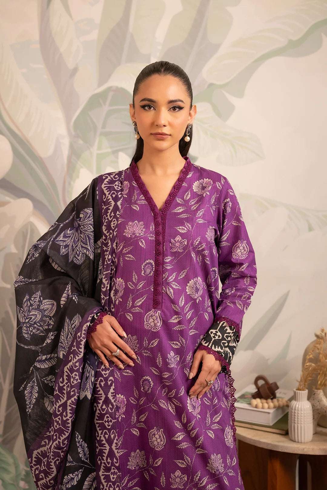 Top new printed lawn dress design – a striking mix of purple hues with delicate floral motifs and a bold contrast dupatta for a sophisticated touch.