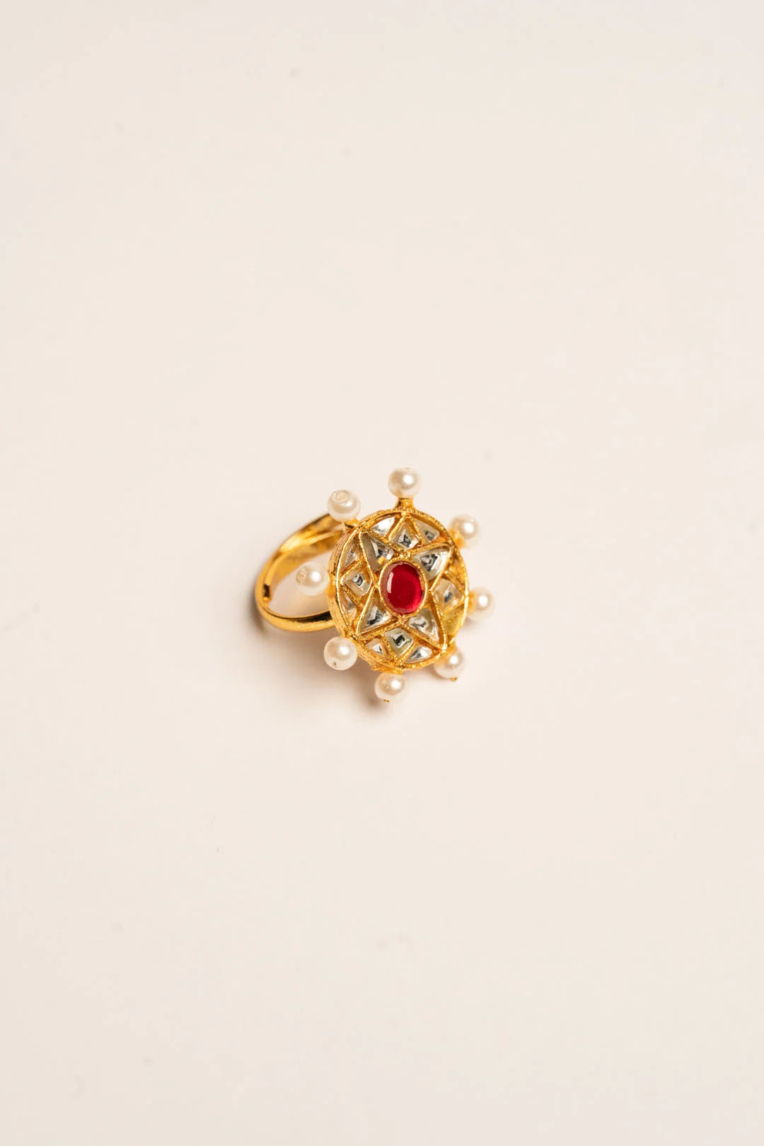 Traditional Kundan gold ring red stone pearl halo close-up adjustable women Barat Pakistan