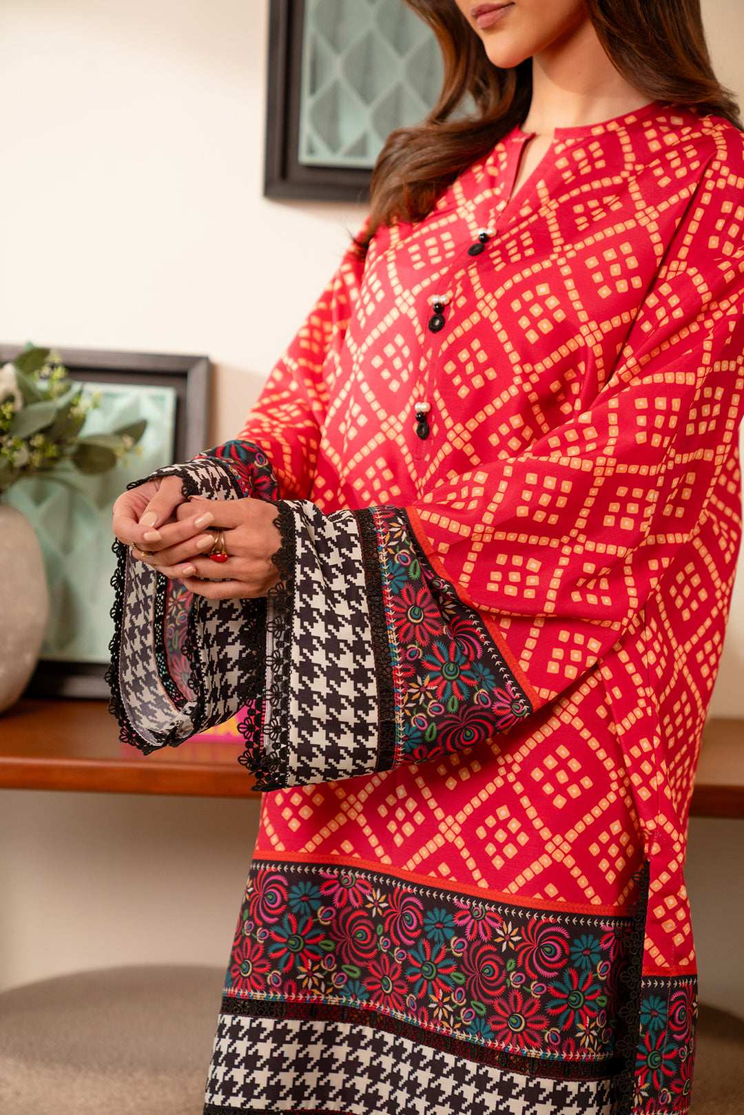 Trendy 2 piece cambric dress – digital printed kurta and trouser set with elegant black and multicolor patterns.